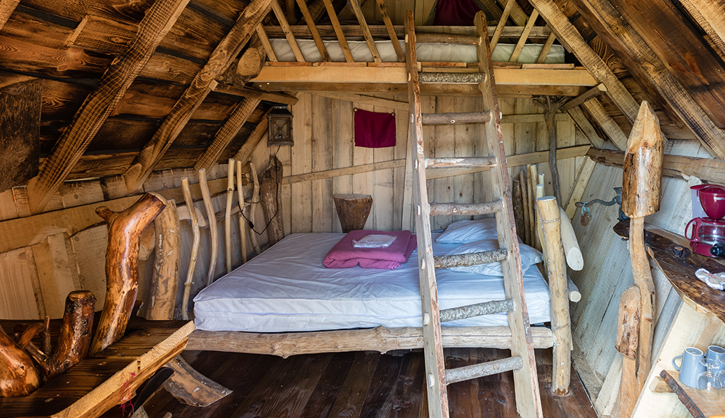 Coin chambre, hébergement insolite au camping les Castors en Alsace